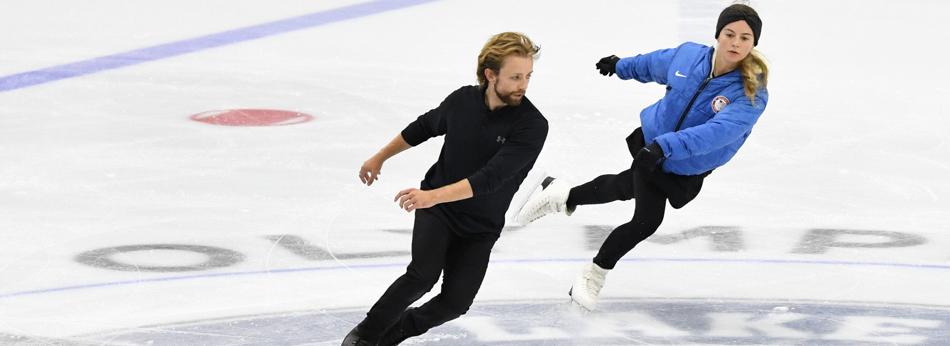 Olympic pairs figure skaters Kaitlin Hawayek and Jean-Luc Baker skate on the ice at the 1932 Jack Shea Arena inside the Olympic Center in Lake Placid