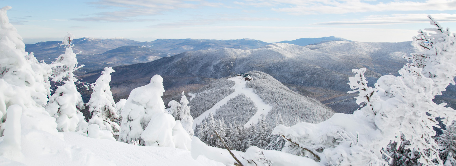 A wintry, snow covered landscape view of Little Whiteface from Parron's Run near the Whiteface Mountain summit.