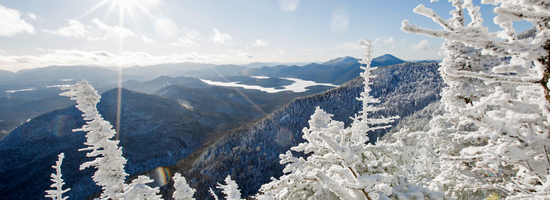 A high altitude view of Lake Placid on a sunny winter day from the top of Whiteface Mountain.