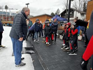 Some of the Henry's Kids program participants about to take to the ice on the oval at World Skating Day celebration 2023. 