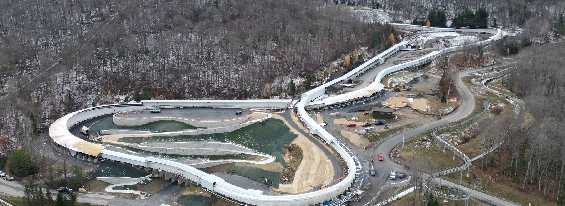 Aerial view in late fall of nearly the full length of the Mt Van Hoevenberg combined sliding track.