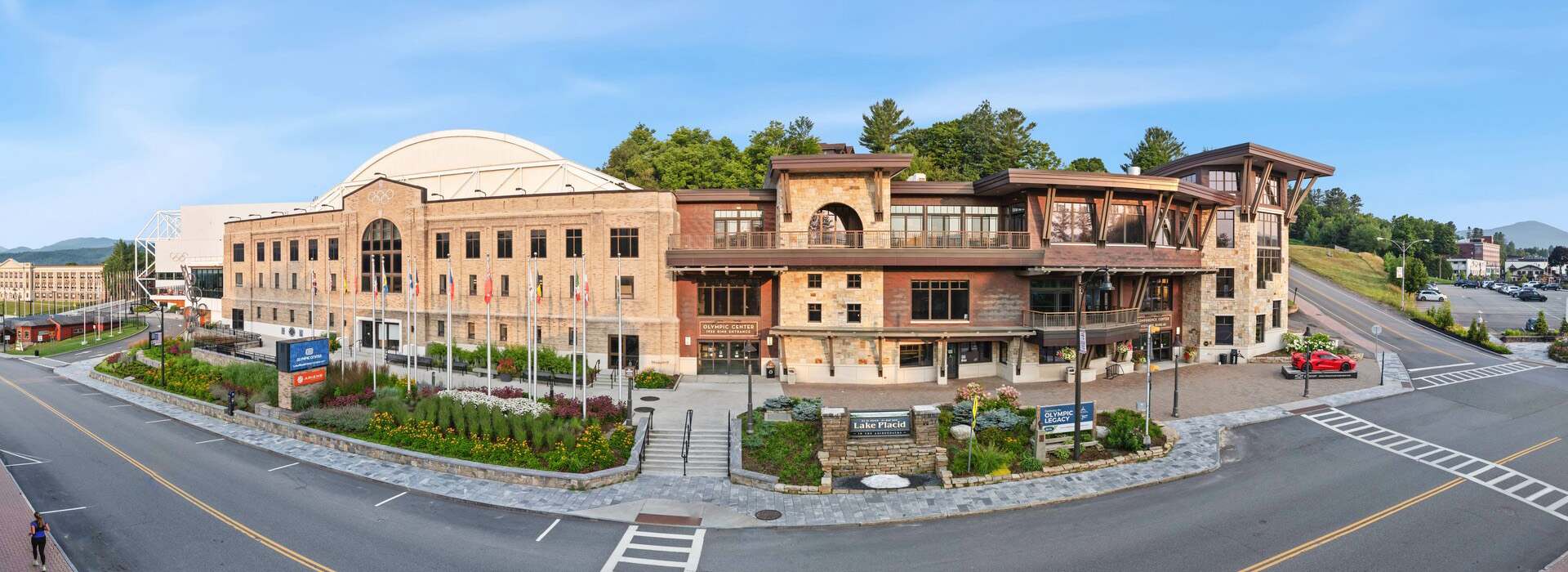 A portion of the Olympic Center in downtown Lake Placid featuring the 1932 rink entrance at the left and the Conference Center entrance to the right in daytime during summer.
