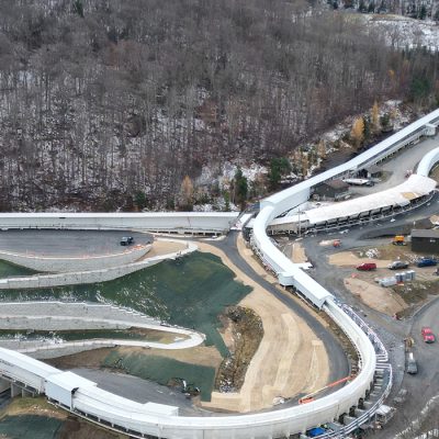 Aerial view in late fall of nearly the full length of the Mt Van Hoevenberg combined sliding track.