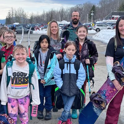 A group of about 15 Johnsburg elementary school children and their teachers at Gore Mountain.